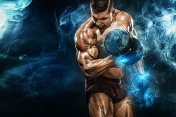Foto op Plexiglas Brutal strong muscular bodybuilder athletic man pumping up muscles with dumbbell on black background. Workout bodybuilding concept. Copy space for sport nutrition ads. © Mike Orlov