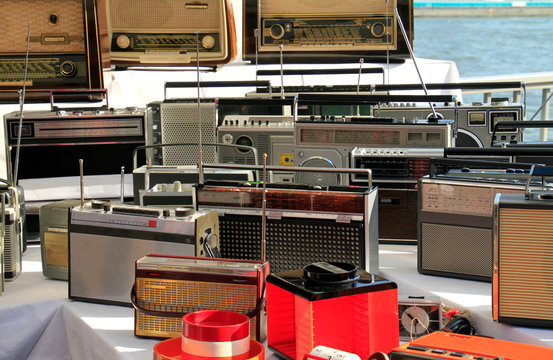 Numerous Old Radios On A Flea Market