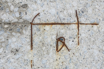 Concrete surface with rusty rebars