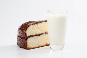 Glass of milk and cake