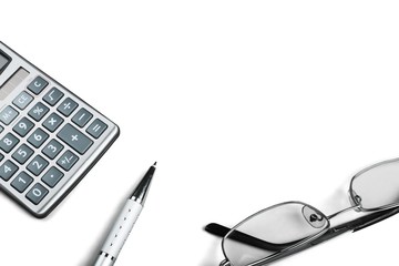 Pen, Calculator and Eyeglasses