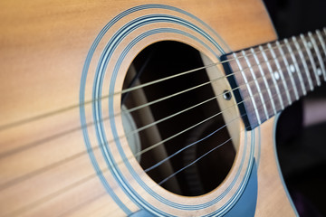 Trembling guitar string, electronic shutter distortion effect. Close-up image of resonating strings captured with wave effect