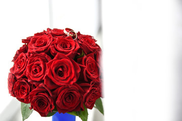 Red roses on a blurred background. Valentine's Day