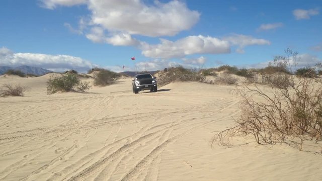 Ford raptor driving off-road in the desert 