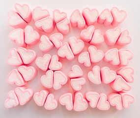 Pink marshmallow background, Many hearts marshmallows, Sweets in the form of hearts of marshmallow. Valentine's Day Gift