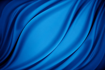 Blue silk texture of satin abstract background.