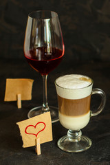 Latte in a transparent cup, macaroon cake (coffee dessert). Top Food background