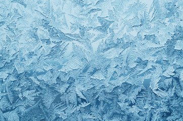 Abstract frosty pattern on glass, background texture - obrazy, fototapety, plakaty