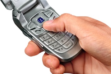 Holding a flip phone style cell phone