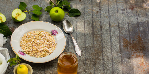 oatmeal, oat flakes, coffee for breakfast (table set). Top Food background