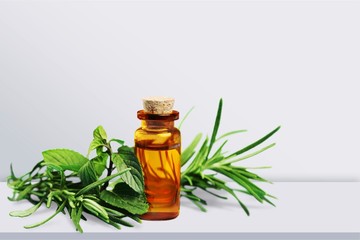 Essential Oil with Rosemary Sprig Isolated
