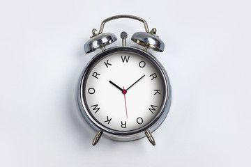 Silver Alarm Clock - Time Concept with word Work and white background