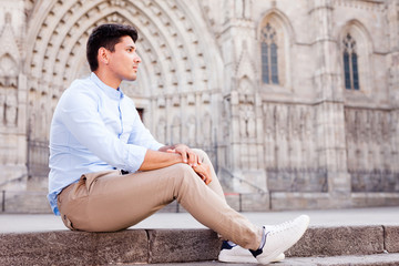 man posing in gothic quarter of Barcelona