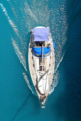 Beautiful photo of the yacht from above in the open sea.
