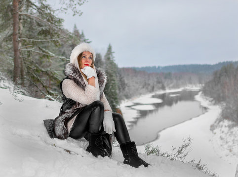 Winter photos of beautiful blue-eyed girl .
