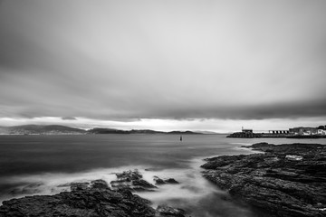 Cliffs and small lighthouse in Pontevedra, Spain