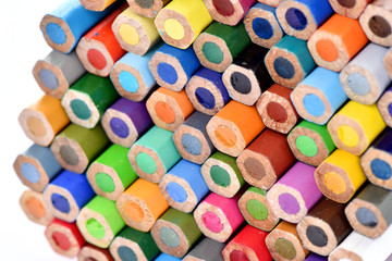 Color pencils, macro. Bright background. Stationery for drawing.	