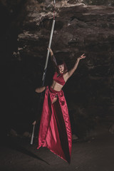 Woman practicing pole dance