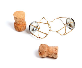 Two corks from champagne wine and muselets