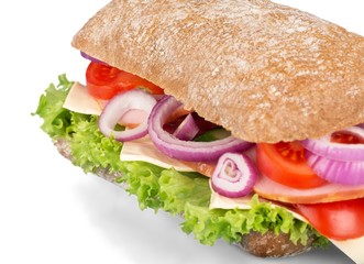 Fresh multi-grain turkey/chicken sub on white background