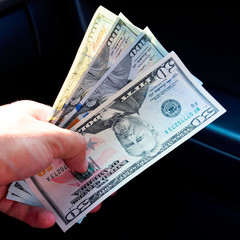 Hand transmitter dollars. Transferring money out of the hands. A