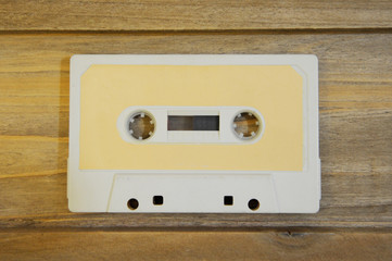Old tapes cassettes for recording on wooden background