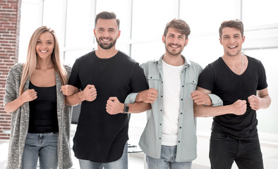 Smiling Business team standing in office and look at camera