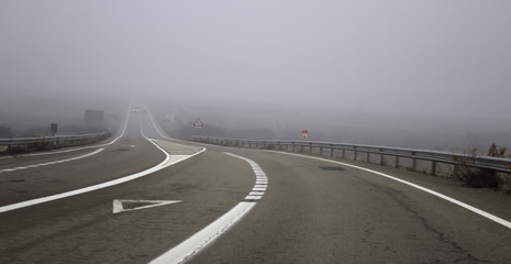Fototapeta premium Motorway highway with fog