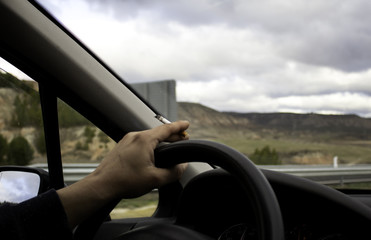 Man smoking driving