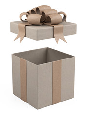 Gift box open with ribbon and bow wrapped in recycled paper.