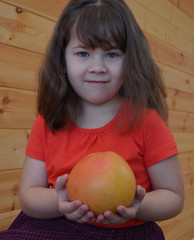 Fototapeta premium little girl with an apple