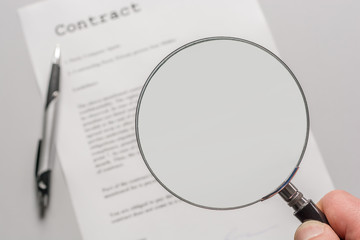 Contract with empty magnifying glass as a template for further processing