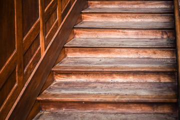Close-up detail of brown wooden stairs