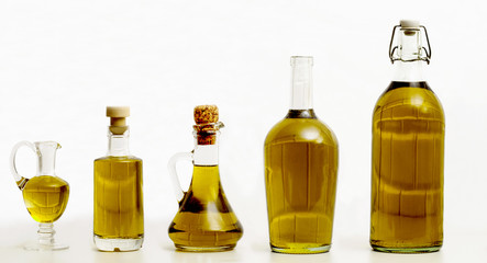 olive oil products over wooden table