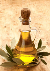 olive oil products over wooden table