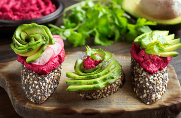 useful sandwiches with beet hummus and avocado