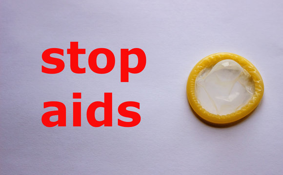 Condom as a symbol of protection from AIDS. Concept is a healthy lifestyle
