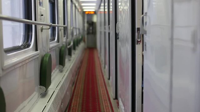 Cute little girl traveling in empty train