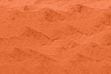 Texture of bauxite minerals, orange soil and earth sample