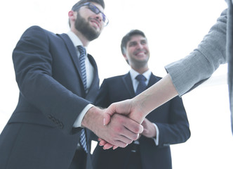 Close-up of business people shaking hands