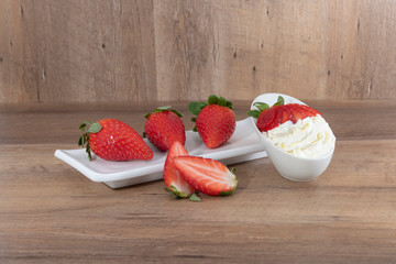 strawberries on a white dish