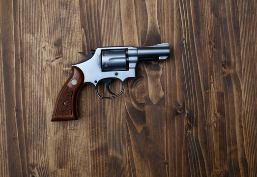  Smith & Wesson on wooden backgraund