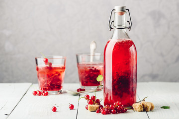 Infused water with red currant and sugar