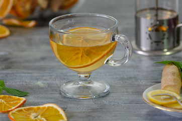 A cup of herbal tea with lemon