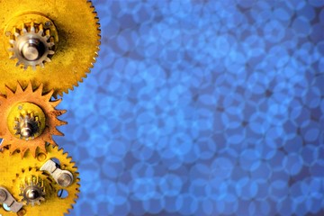 Mechanism details vintage round toothed gears, on the background for the design. Gears transmit...