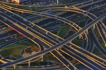 Fototapeta na wymiar Night aerial dron view of highway interchange, birds eye, United Arab Emirates
