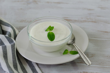 Homemade yogurt on wooden table