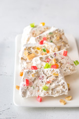 White nougat slices on white plate