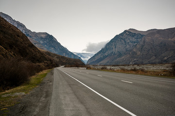 Asphalt road winding among the mountains in Georgia. Military-Georgian road