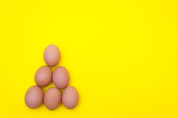 Egg, Eggs on a yellow background. Egg tray